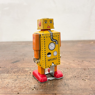 Petit robot marcheur jaune en métal