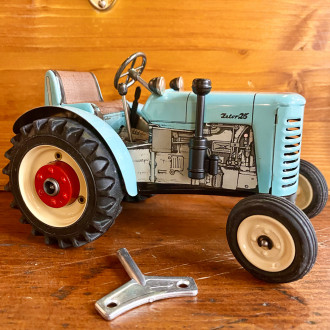 tracteur mécanique bleu