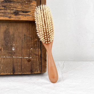 Wood and horn hairbrush