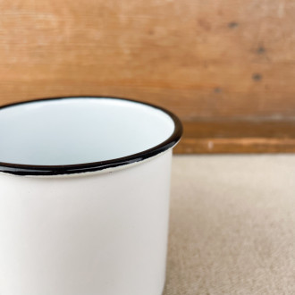 white enamel mug with black trim