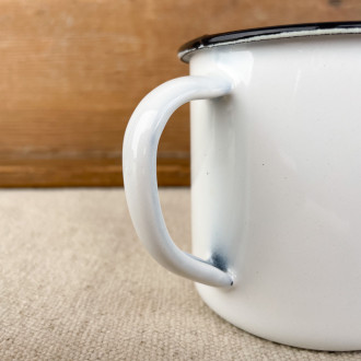 Cup in white enamel with black edging