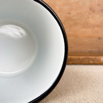 Cup in white enamel with black edging