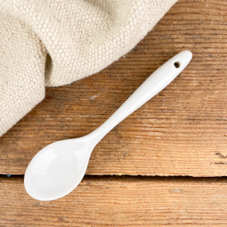 Small white porcelain spoon