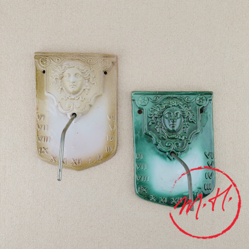 Enamelled escutcheon sundial