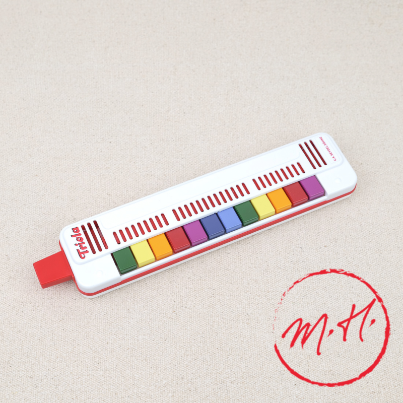 Triola key harmonica