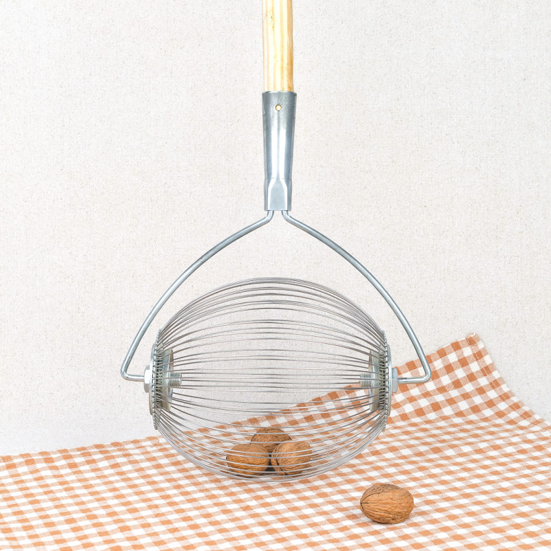 Walnut ball with wooden handle