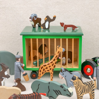 Zoo tractor and wooden fences