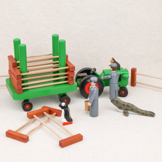 Zoo tractor and wooden fences