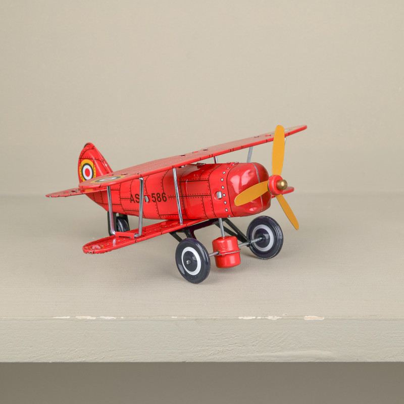 Red aeroplane with key