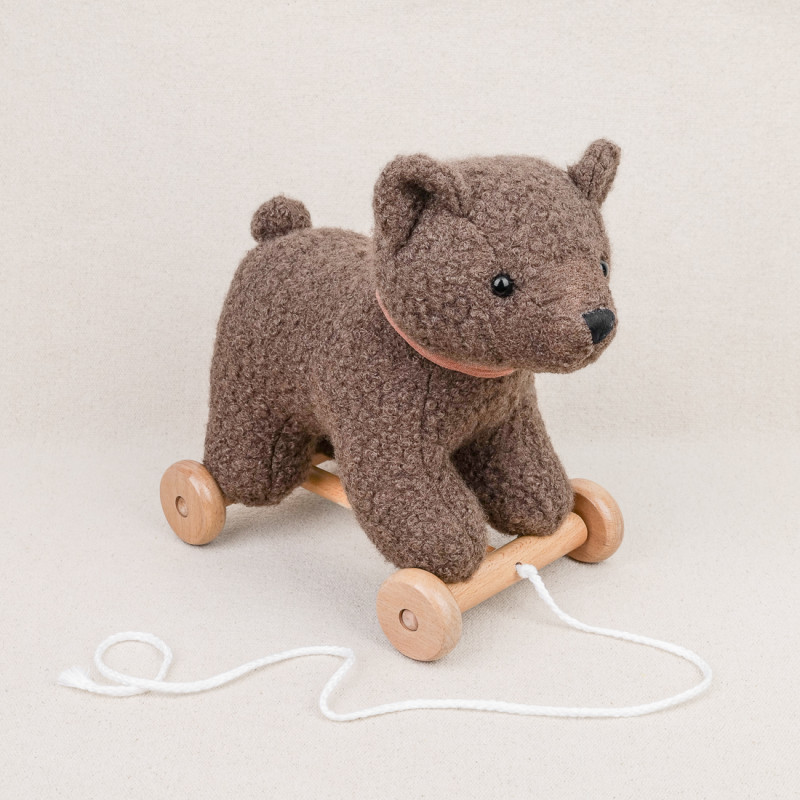 Brown bear on wheels