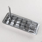 Stainless steel ice cube tray with ejector