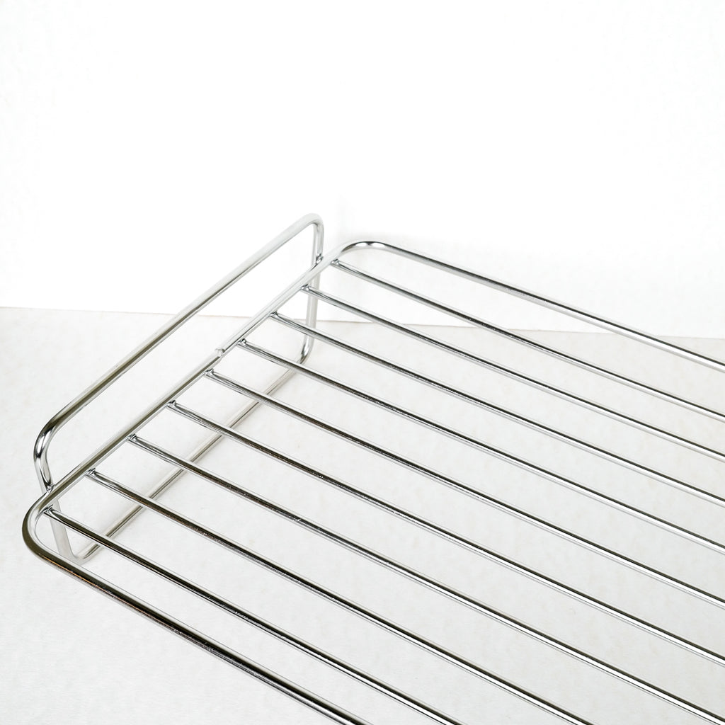 Roasting rack for a baking dish