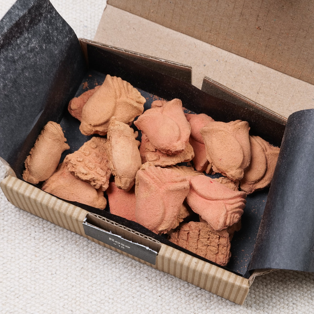 Cade wood incense figurines