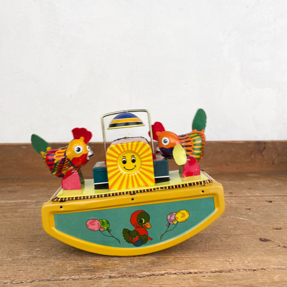 Mechanical hens seesaw