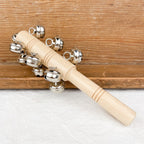 Baton with bells in wood and metal