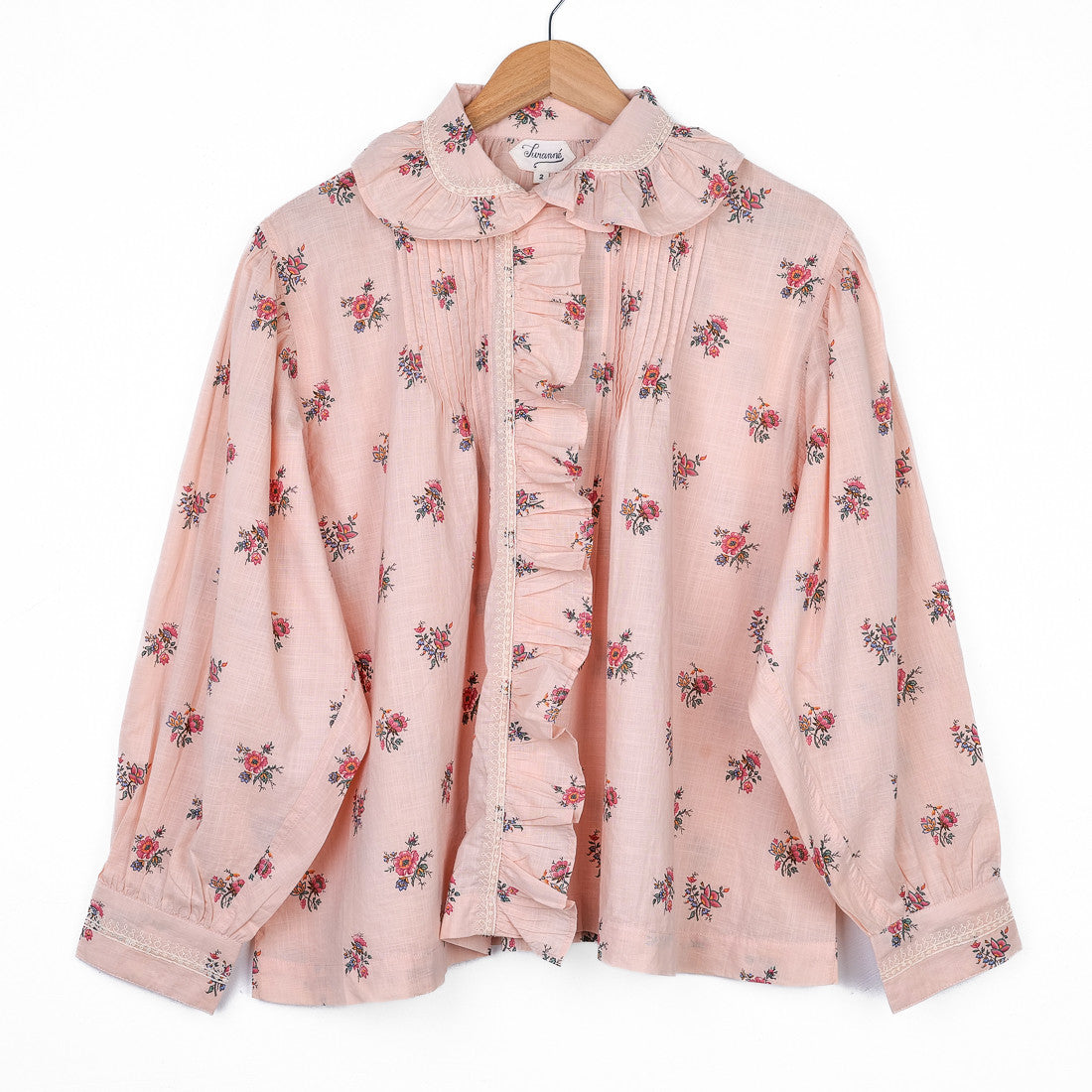 Blouse rose à fleurs