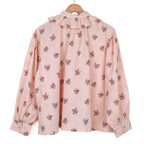Blouse rose à fleurs