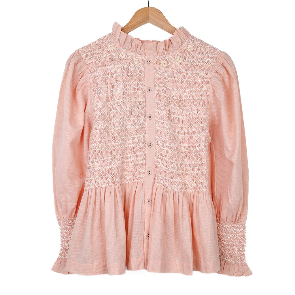Pink smocked blouse