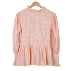 Pink smocked blouse