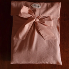 Pink smocked blouse