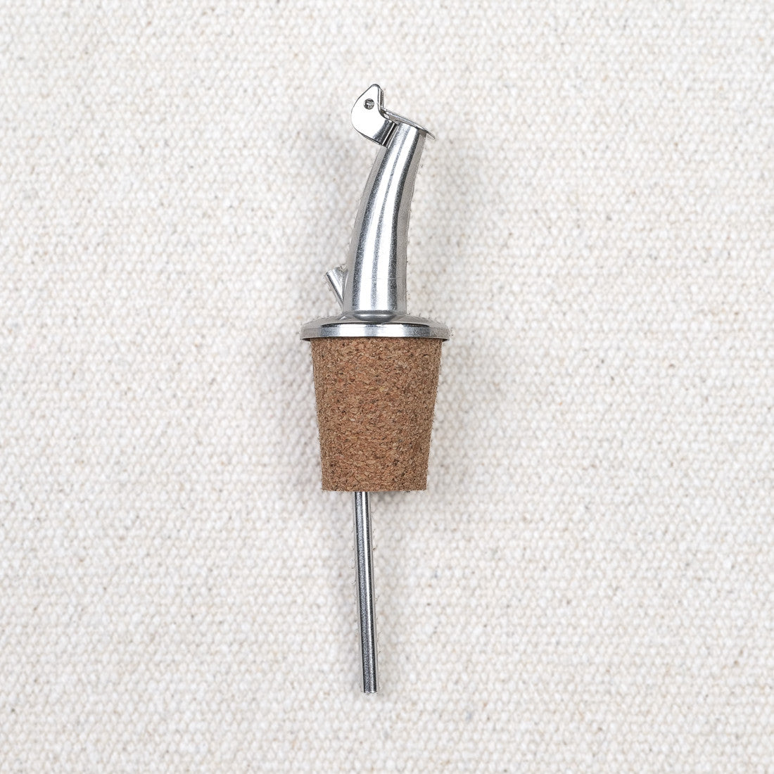 Stainless steel and cork pourer