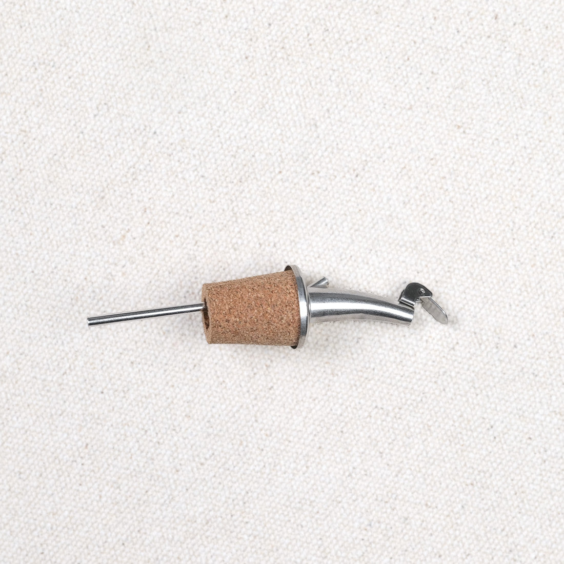 Stainless steel and cork pourer
