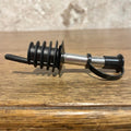 Plastic and stainless steel pouring stopper