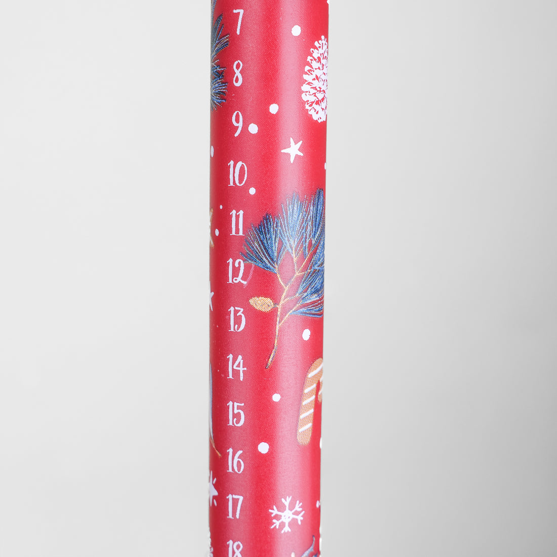Chandelle de Noël rouge à décor de sucres d'orge et pommes de pin, numérotée de 7 à 18, 30 cm, Coppenrath-Spiegelburg