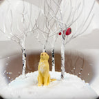 Labrador dog in the woods snow globe