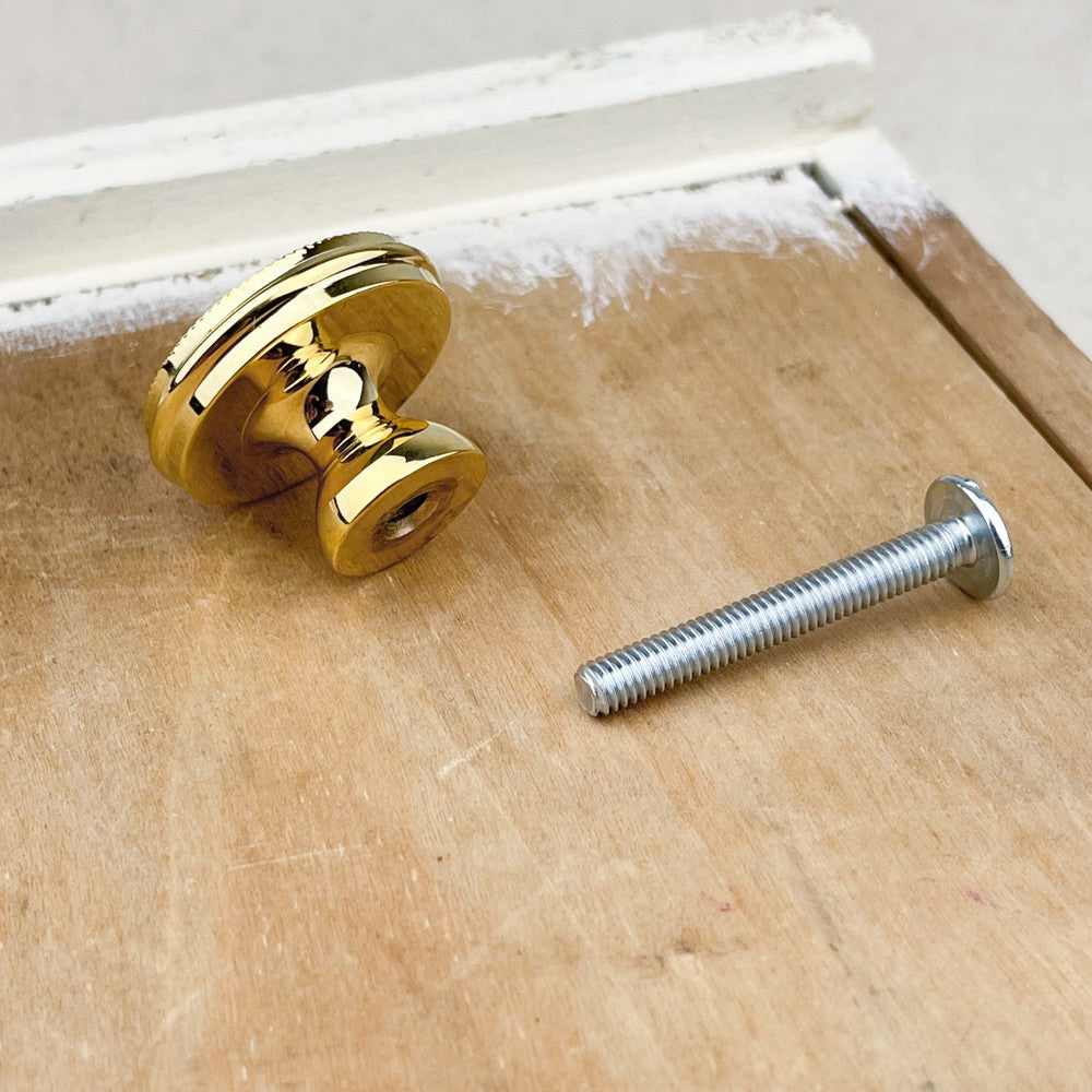 Polished brass knurled cup knob