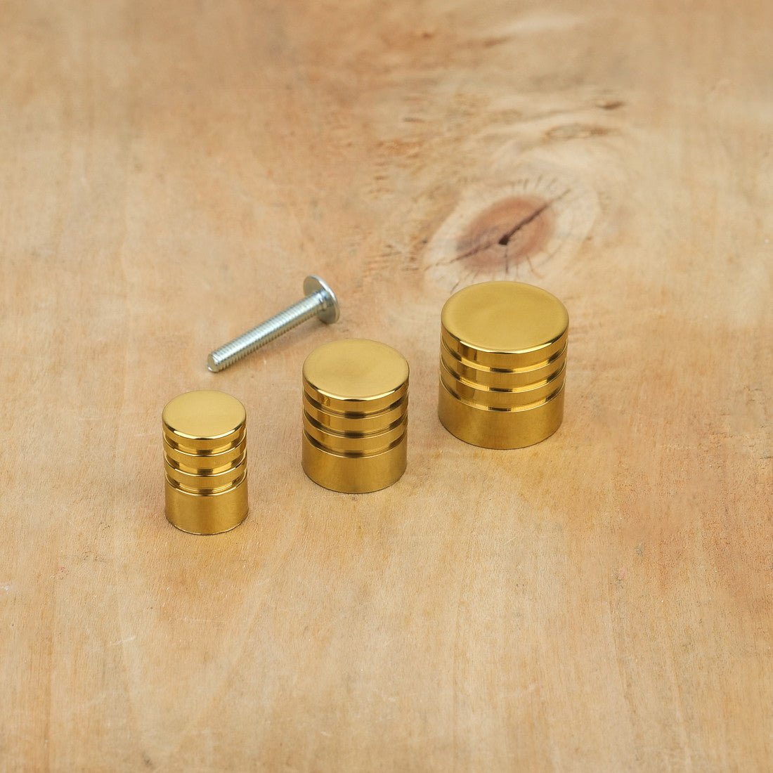 Bouton de meuble cylindre laiton poli