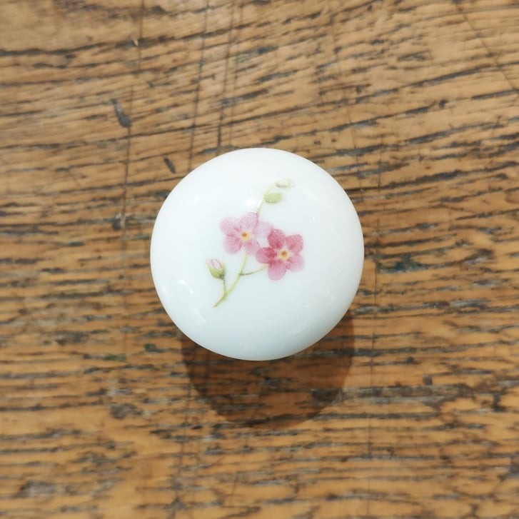 Porcelain drawer knob with flower pattern