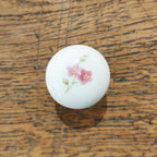 Porcelain drawer knob with flower pattern