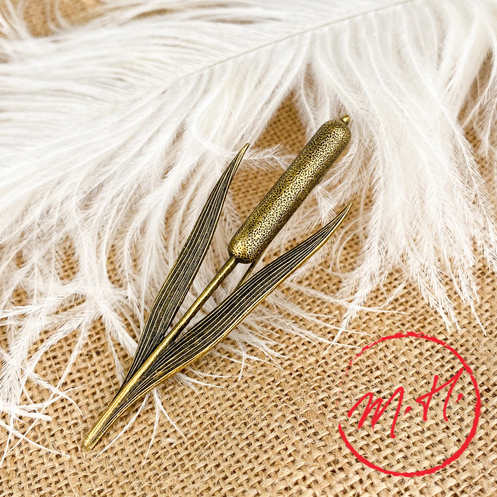 Reed brooch