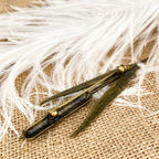 Reed brooch