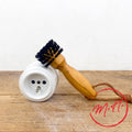 Cleaning brush for electrical outlets