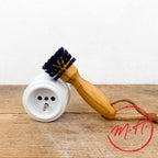 Cleaning brush for electrical outlets