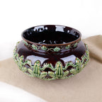 Terracotta pot cover with frog frieze