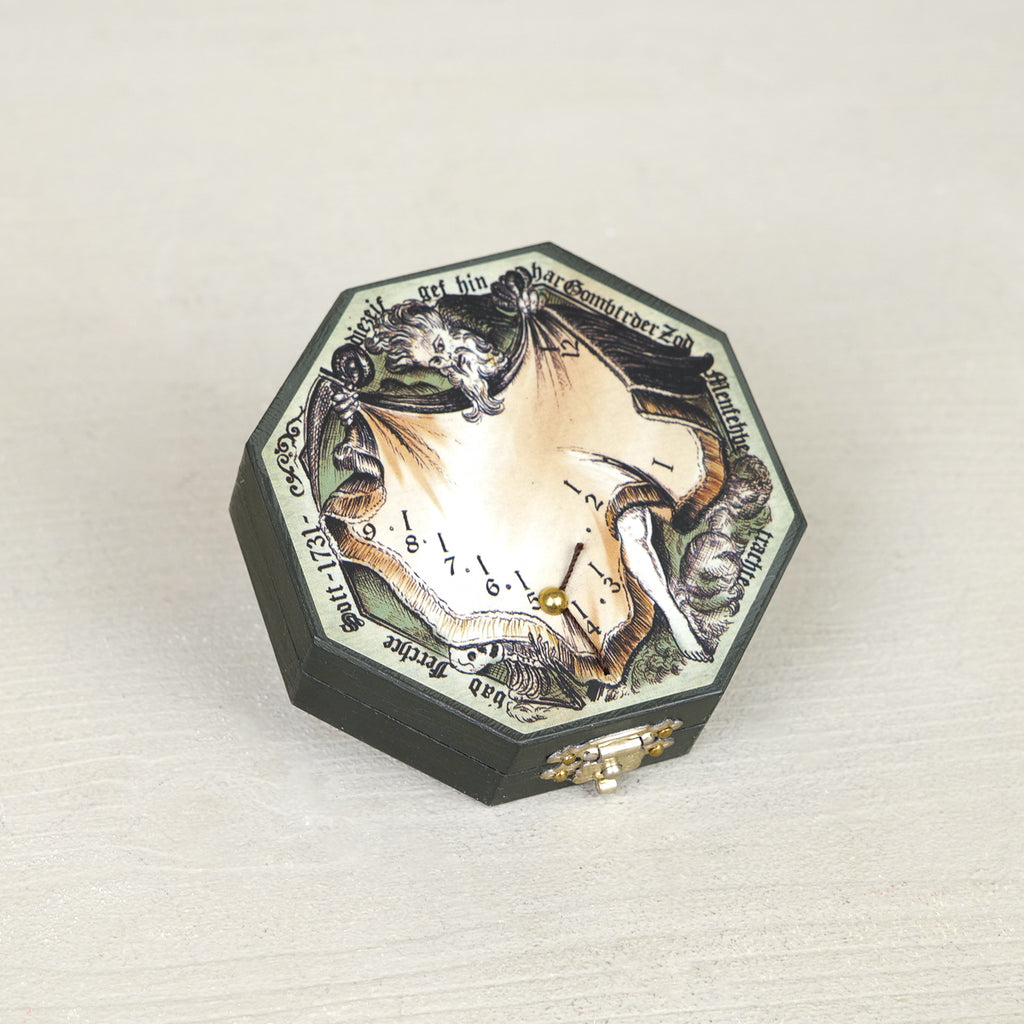 Brass diptych pocket sundial with compass, octagonal antique-style engraving and gilded needle