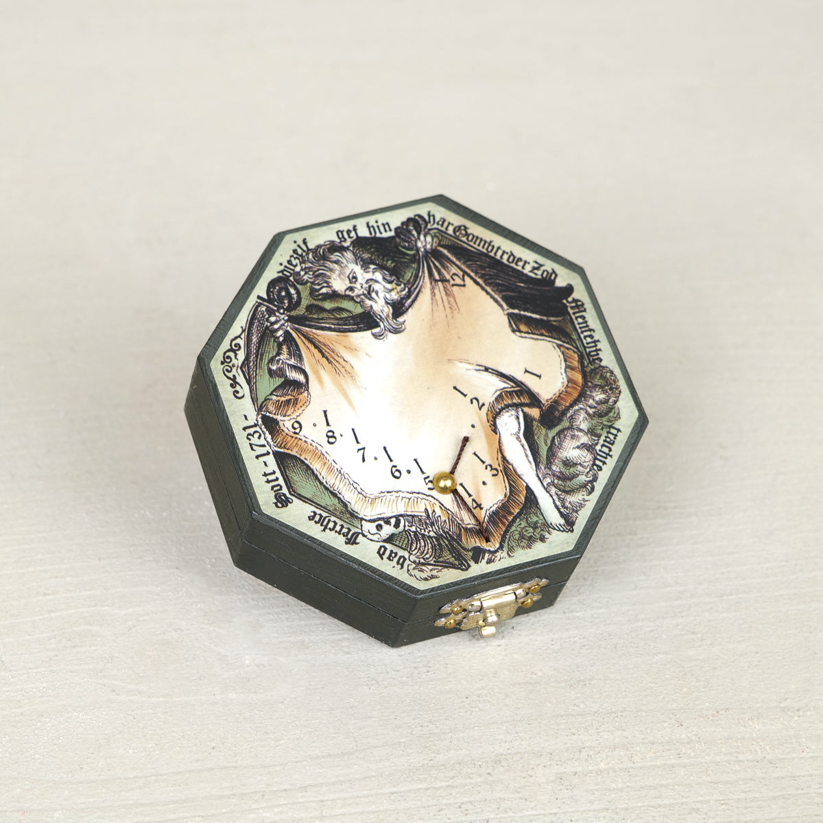 Brass diptych pocket sundial with compass, octagonal antique-style engraving and gilded needle
