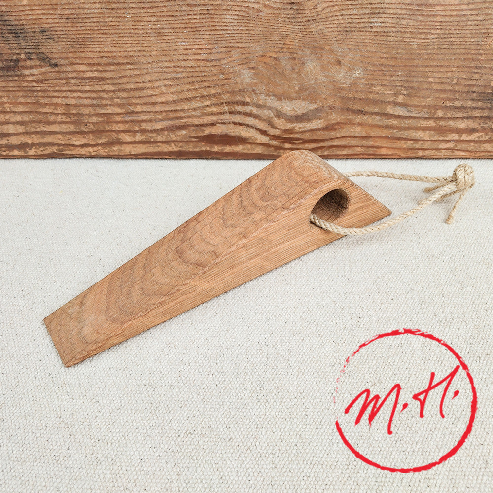 Door wedge in oiled oak with rope