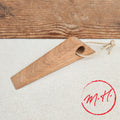 Door wedge in oiled oak with rope