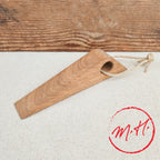 Door wedge in oiled oak with rope