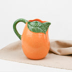 Orange pitcher Bordallo Pinheiro