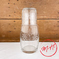 Bedside carafe chased glass