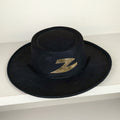 Black felt Zorro hat for kids aged 4-6, wide-brimmed dress-up costume hat with gold Z on the crown