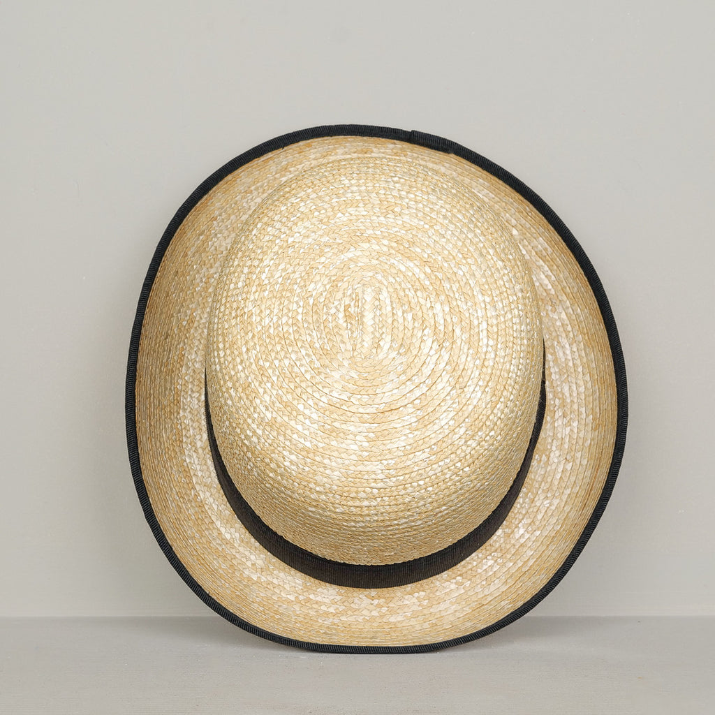 Woven straw bowler hat