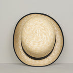 Woven straw bowler hat