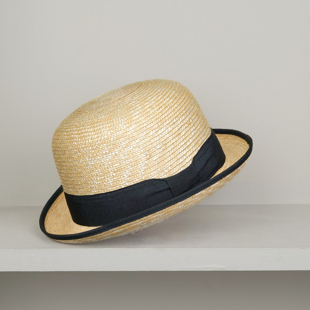 Woven straw bowler hat