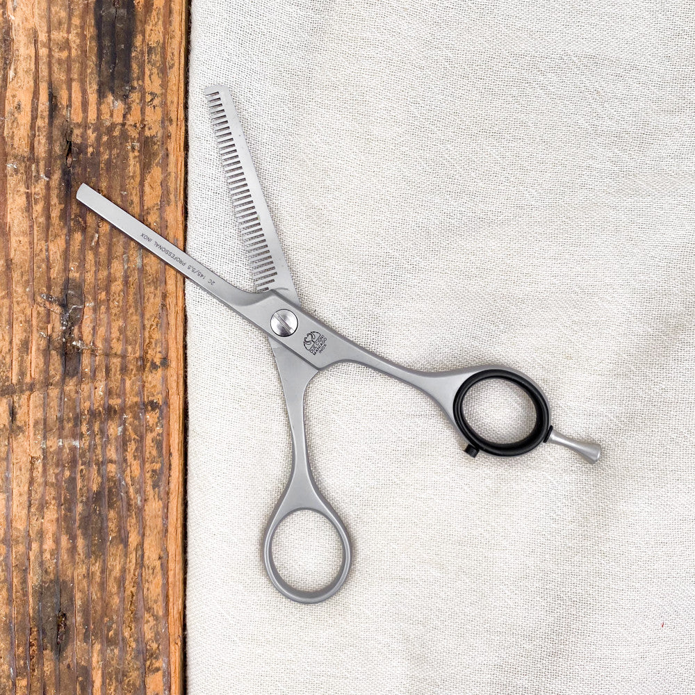 Thinning hairdressing scissors